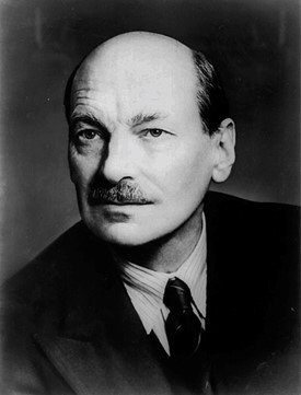 Head and shoulders portrait photograph of a man.